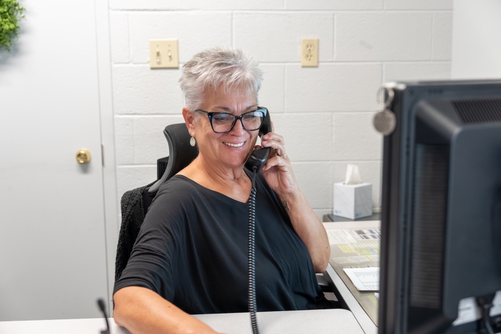 Burch employee answering phone