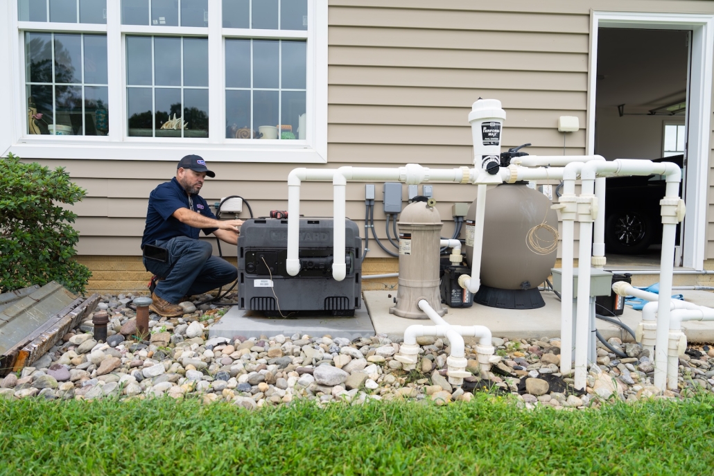 Burch technician working on pool heater system