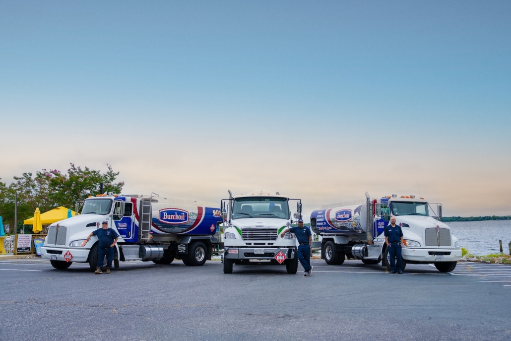 Burch delivery trucks and employees