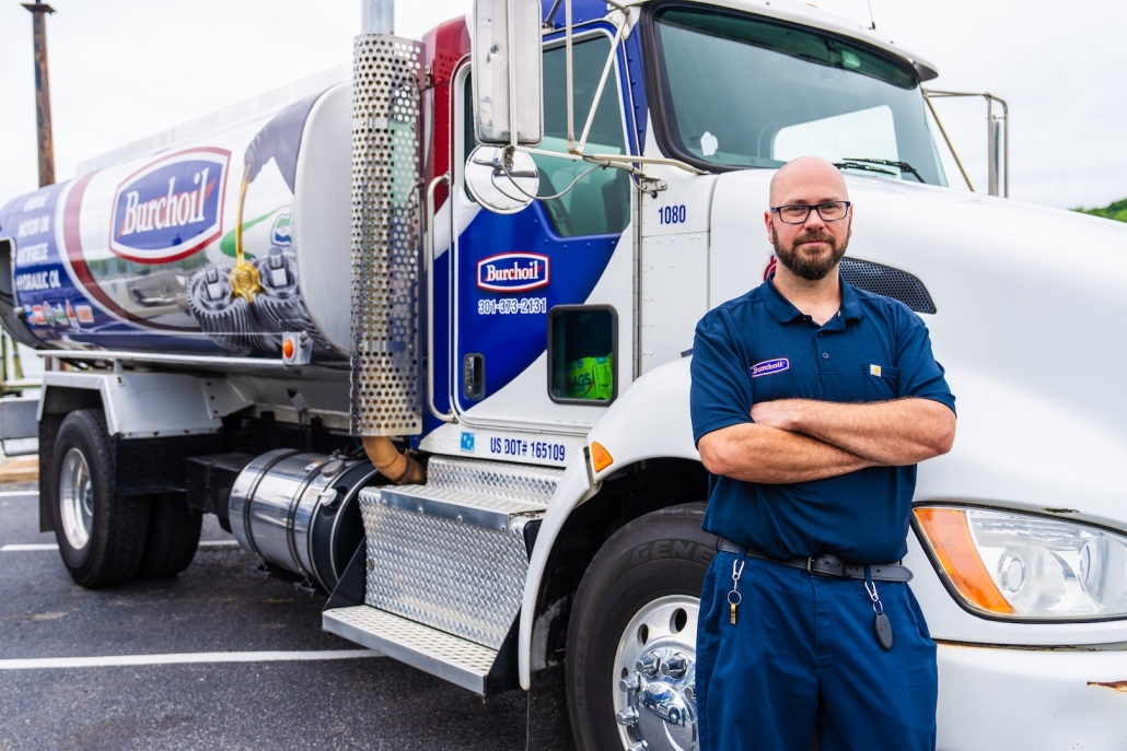 Burch worker next to propane truck
