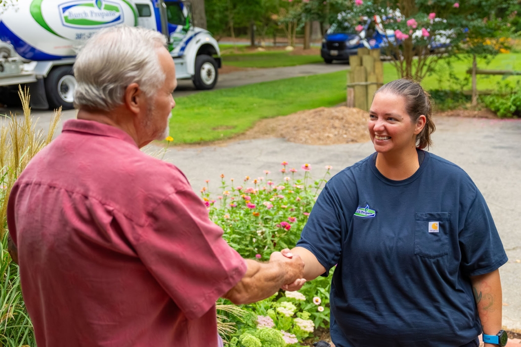 worker shaking customer's hand